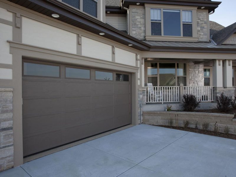 Contemporary aluminum and glass wholesale garage doors for modern properties.